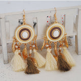 New circle tassel earrings Autumn and winter wool thread earrings National wind long leaf ornaments