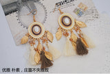 New circle tassel earrings Autumn and winter wool thread earrings National wind long leaf ornaments